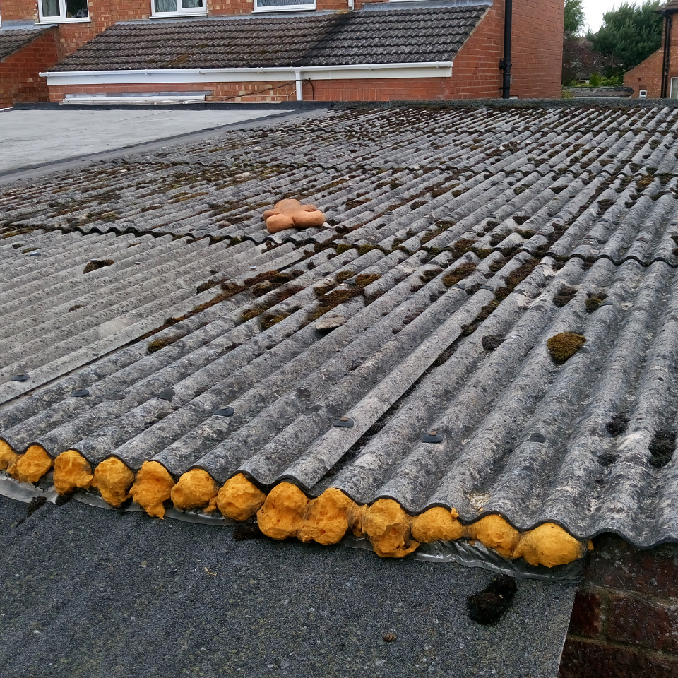 Asbestos garage roof removal